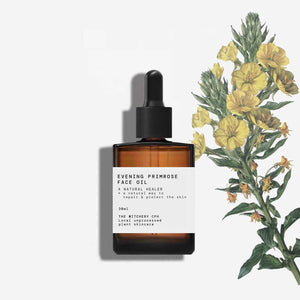 Evening primrose face oil bottle with botanical illustration on a white background
