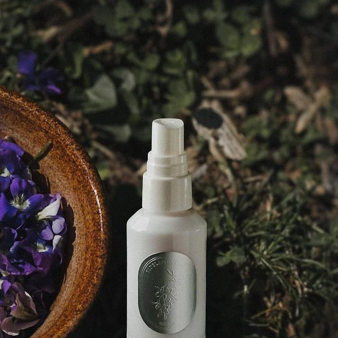 Tidelands House Honey Balm & Violet Facial Essence, a limited-release hydrosol with antioxidant-rich Melissa and Violet, soothing and hydrating skin.