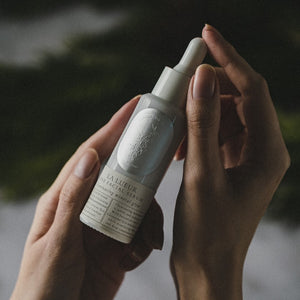 TIDELANDS HOUSE La Lueur Illuminating Facial Serum with CoQ10 and glowing minerals in a glass bottle