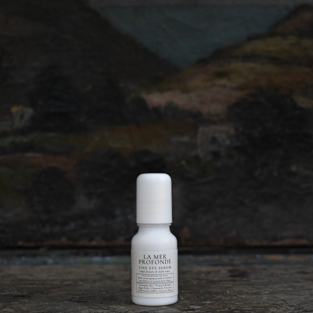 TIDELANDS HOUSE La Mer Profonde Eye + Full Brows Serum in sleek packaging, featuring vibrant seaweed and coffee-infused formula for delicate eye care and brow nourishment.