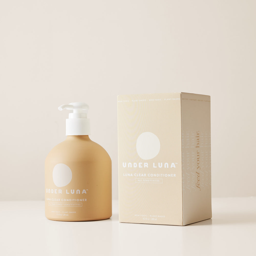Under Luna Luna Clear Conditioner in recyclable aluminum bottle, essential oil-free, with rosemary, plantain, stinging nettle, calendula, and jojoba for hydration and scalp comfort.