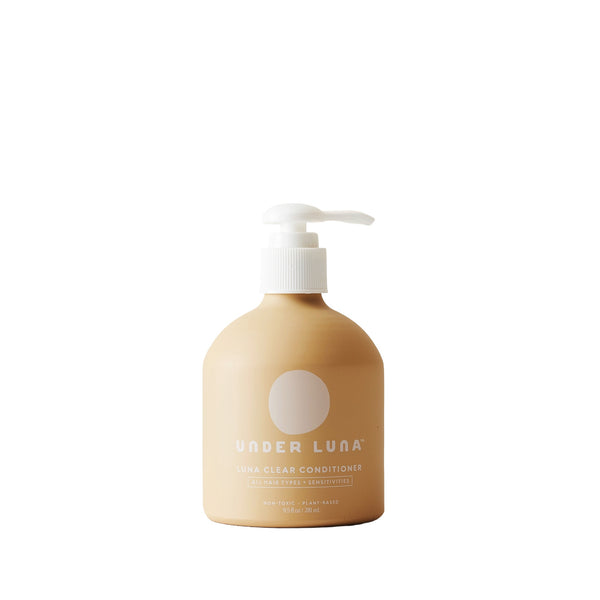 Under Luna Luna Clear Conditioner in recyclable aluminum bottle, essential oil-free, with rosemary, plantain, stinging nettle, calendula, and jojoba for hydration and scalp comfort.