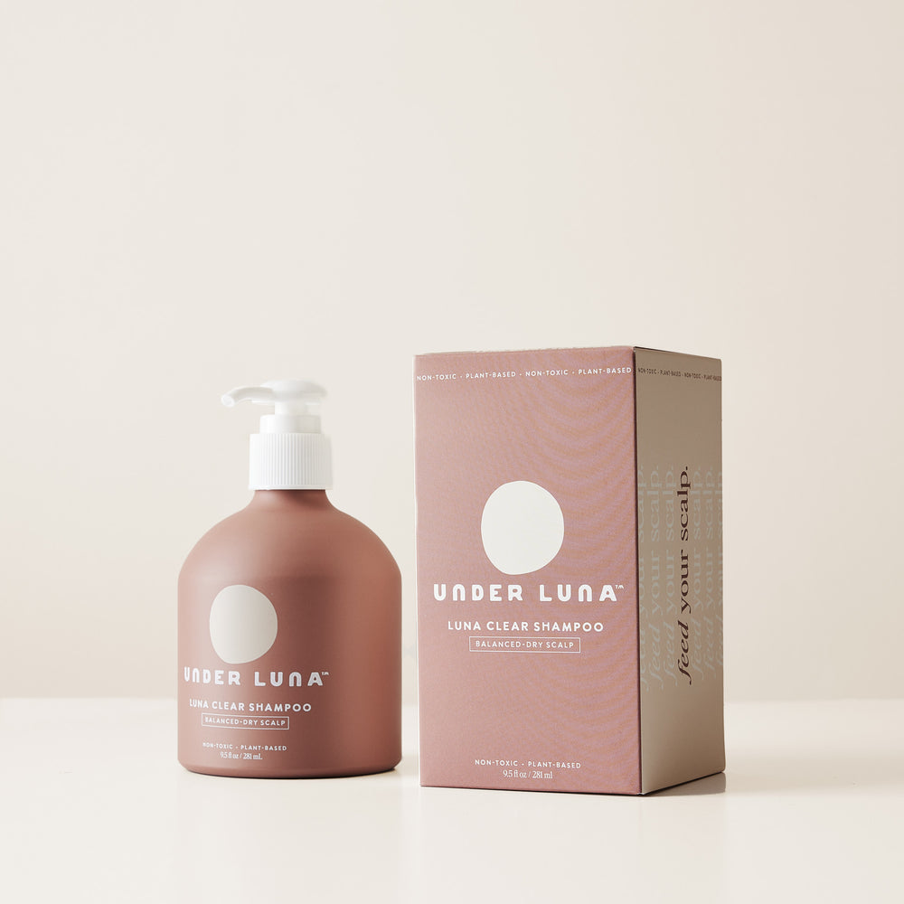 Under Luna Luna Clear Shampoo in recyclable aluminum bottle, essential oil-free, with aloe, plantain, stinging nettle, and jojoba for hydration and scalp comfort.