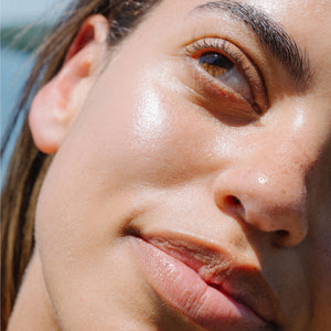 Close-up of a woman's face with a blurred background