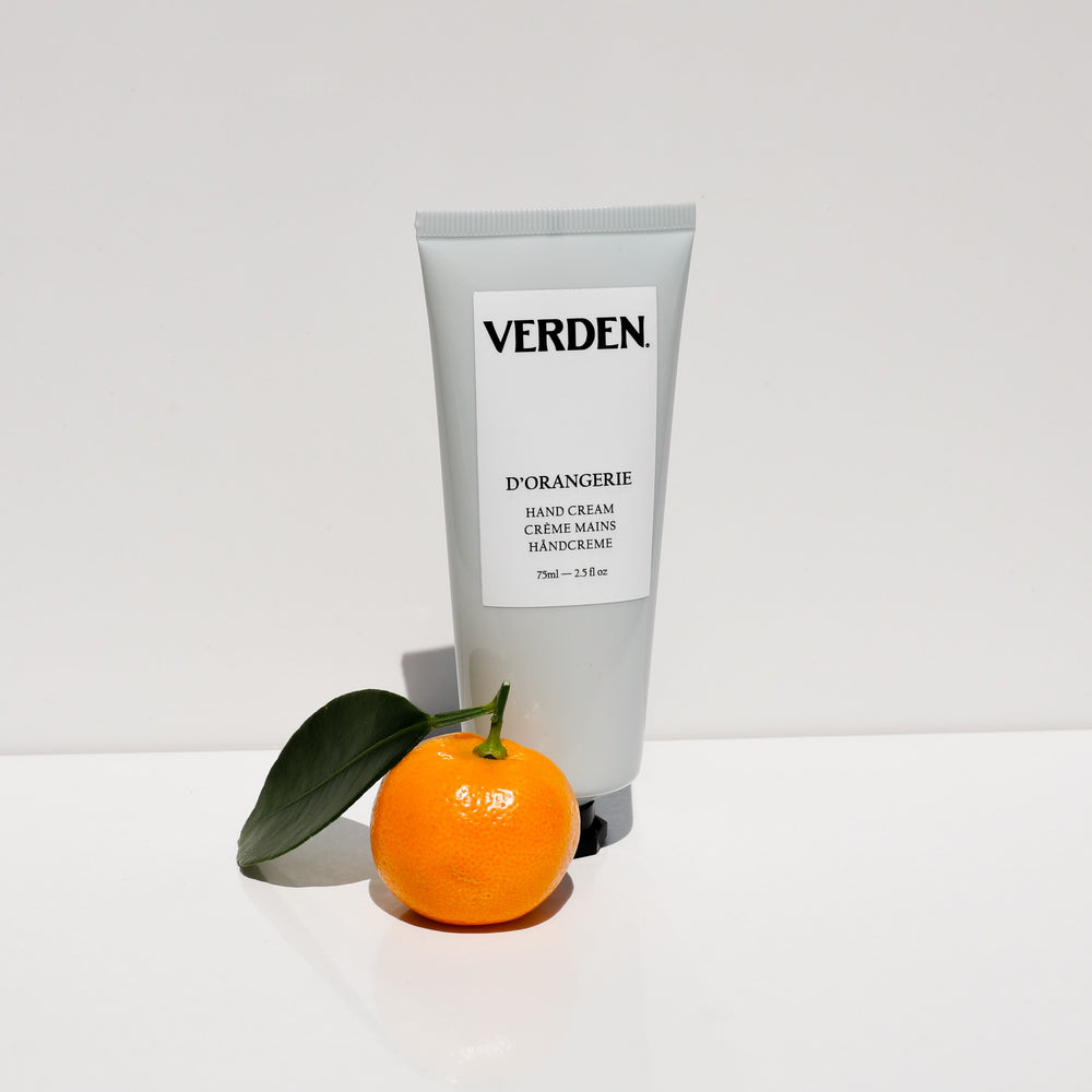 Verden D'Orangerie Hand Cream in a matte silver squeeze tube with a black cap, shown on a plain white background.
