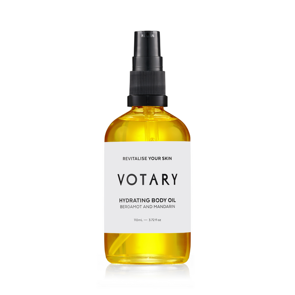 VOTARY Bergamot and Mandarin Hydrating Body Oil in glass bottle with citrus botanical oils