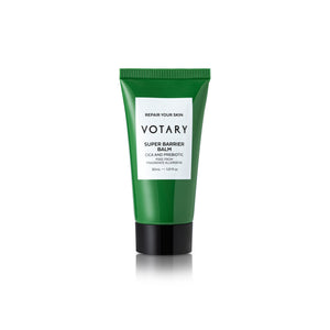 Green tube of Votary Super Barrier Balm on a white background
