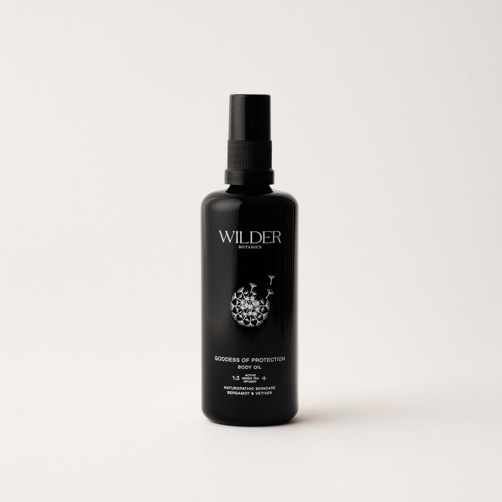 Goddess of Protection Body Oil by Wilder Botanics - a soothing blend of Grapeseed, Sea Buckthorn, and Green Tea oils, enhanced with Bergamot and Vetiver, for skin revitalization and nourishment.