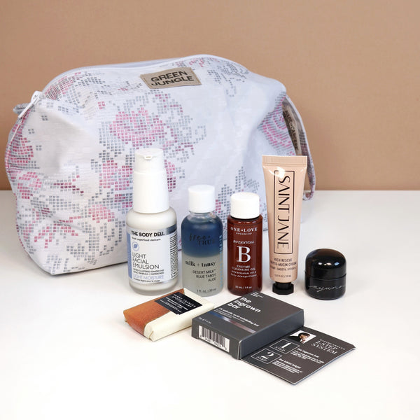 Limited-edition Green Jungle Beauty Shop Winter Bag featuring a handmade Made in Carcere cosmetic pouch and a curated selection of luxury skincare and body care products.