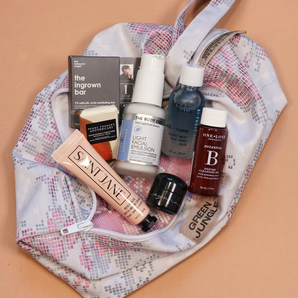 Limited-edition Green Jungle Beauty Shop Winter Bag featuring a handmade Made in Carcere cosmetic pouch and a curated selection of luxury skincare and body care products.