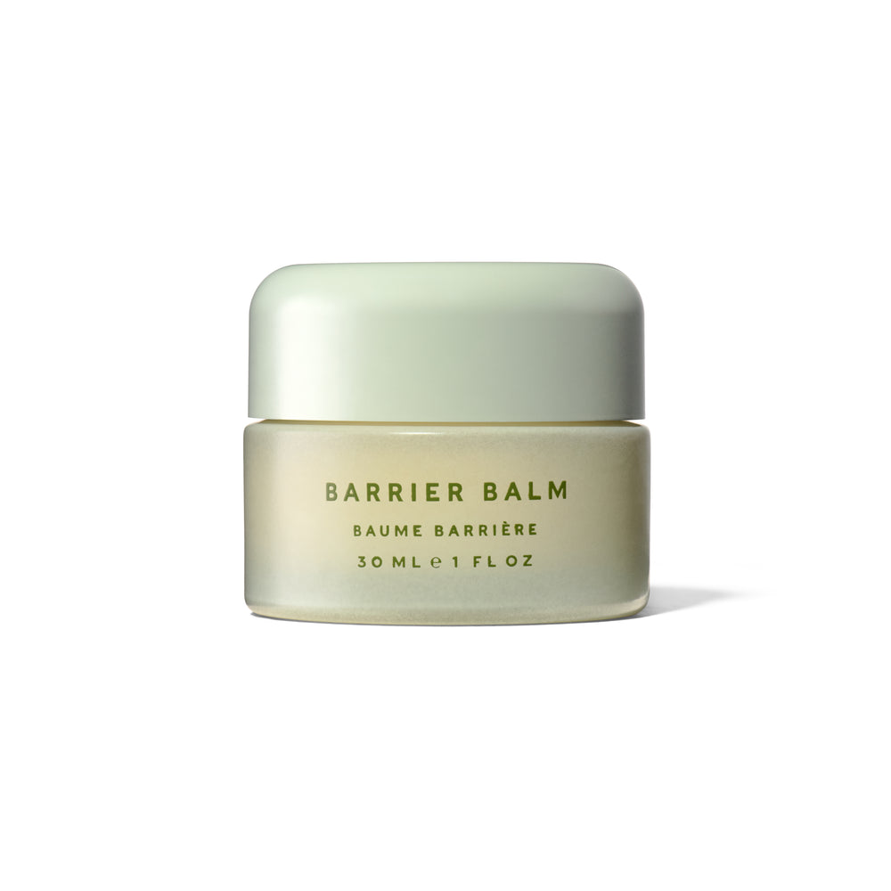 A 30ml jar of Barrier Balm with a pale sage green lid and a matching light beige/cream body, featuring dark green text on a clean white background.