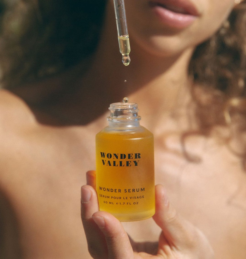 Bottle and box of Wonder Valley serum on a white background
