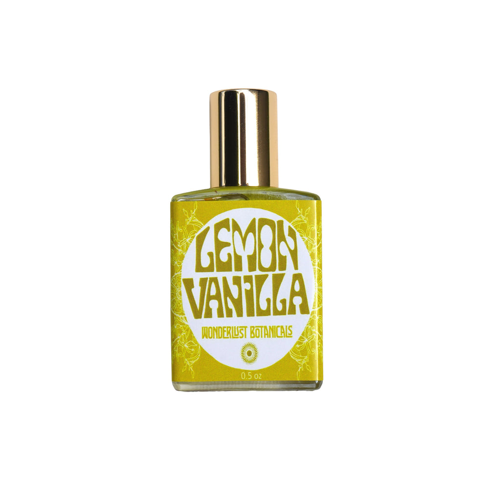 WONDERLUST BOTANICALS Lemon Vanilla natural roll-on perfume in a 0.5 oz glass bottle, featuring a fresh citrus and sweet vanilla blend for an uplifting, summery scent.
