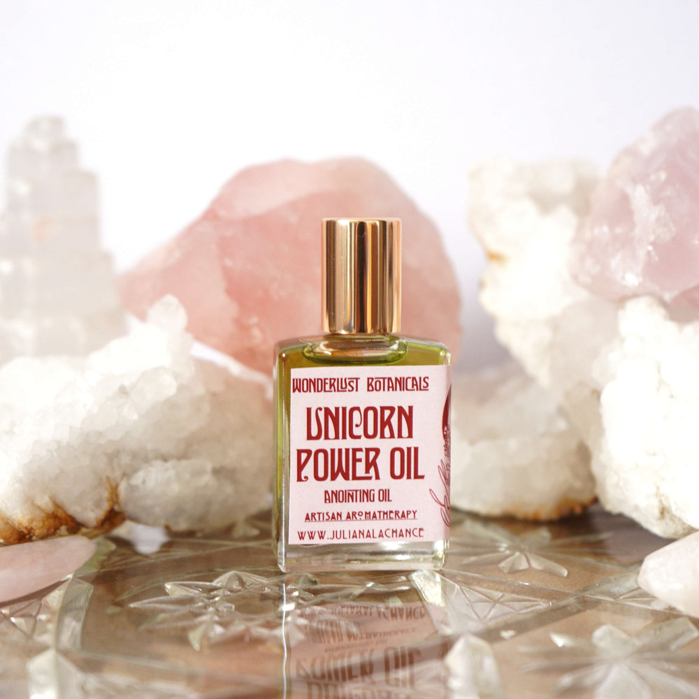 Wonderlust Botanicals Unicorn Power Perfume Oil in a 0.5 oz roll-on bottle, featuring a soothing floral blend of lavender and vanilla.