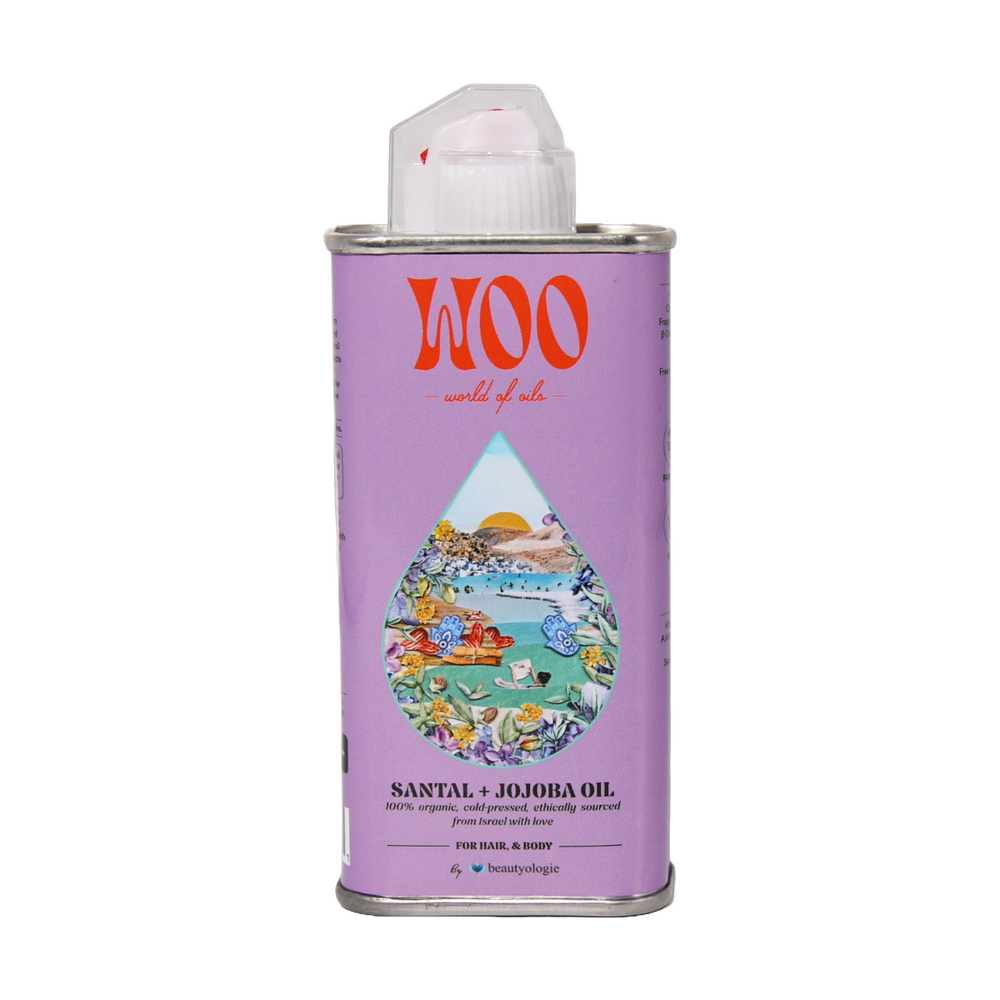 Lavender-colored can of WOO Santal + Jojoba Oil with a colorful label on a white background