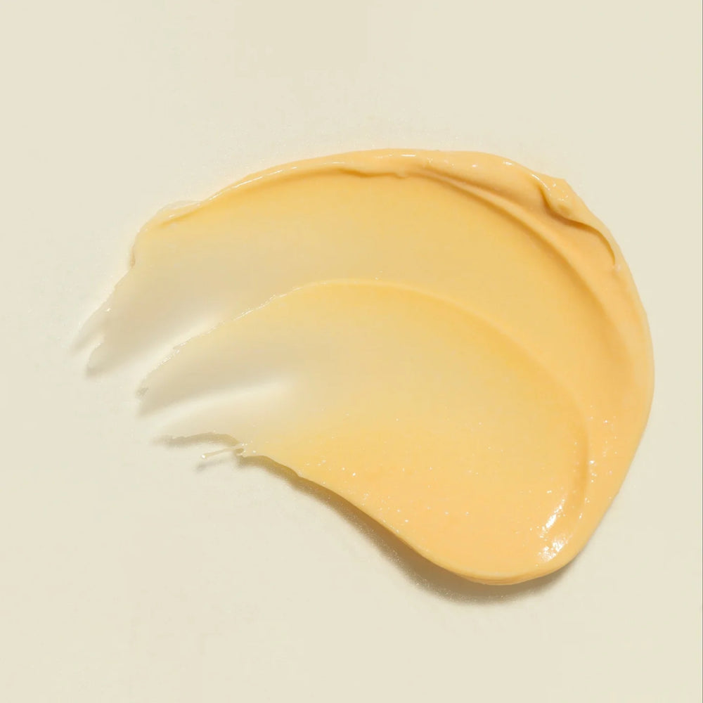 A 50ml jar of YINA Decolletage Creamon a white background with a soft shadow. The jar has a white lid and a warm amber-brown label with white text.
