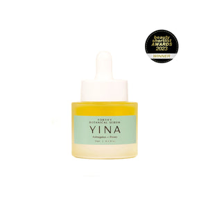 YINA Fortify Botanical Serum in clear glass matte bottle with mint colored label and white pipette on white background