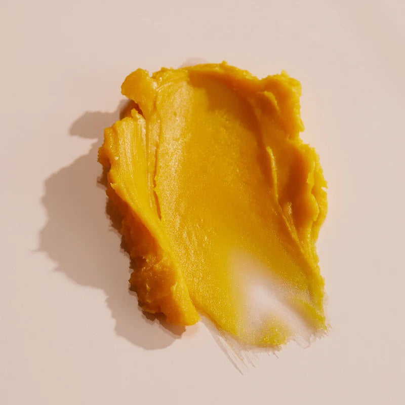 YINA Recovery Body Balm in clear glass jar with orange label and white lid, on white background