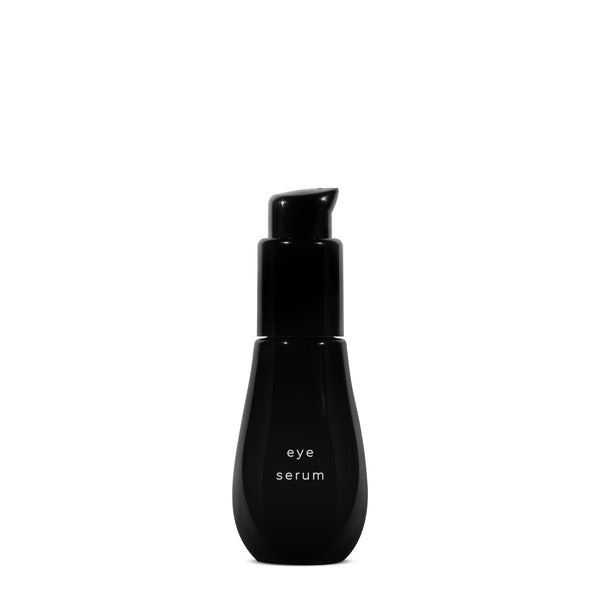 AYUNA Eye Serum in black glass bottle with black pump on white background