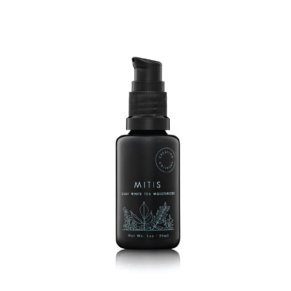 CREATION MITIS lightweight milky face cream in a bottle, formulated with jasmine white tea, vitamin B5, and soothing botanicals to hydrate, firm, and revitalize the skin.