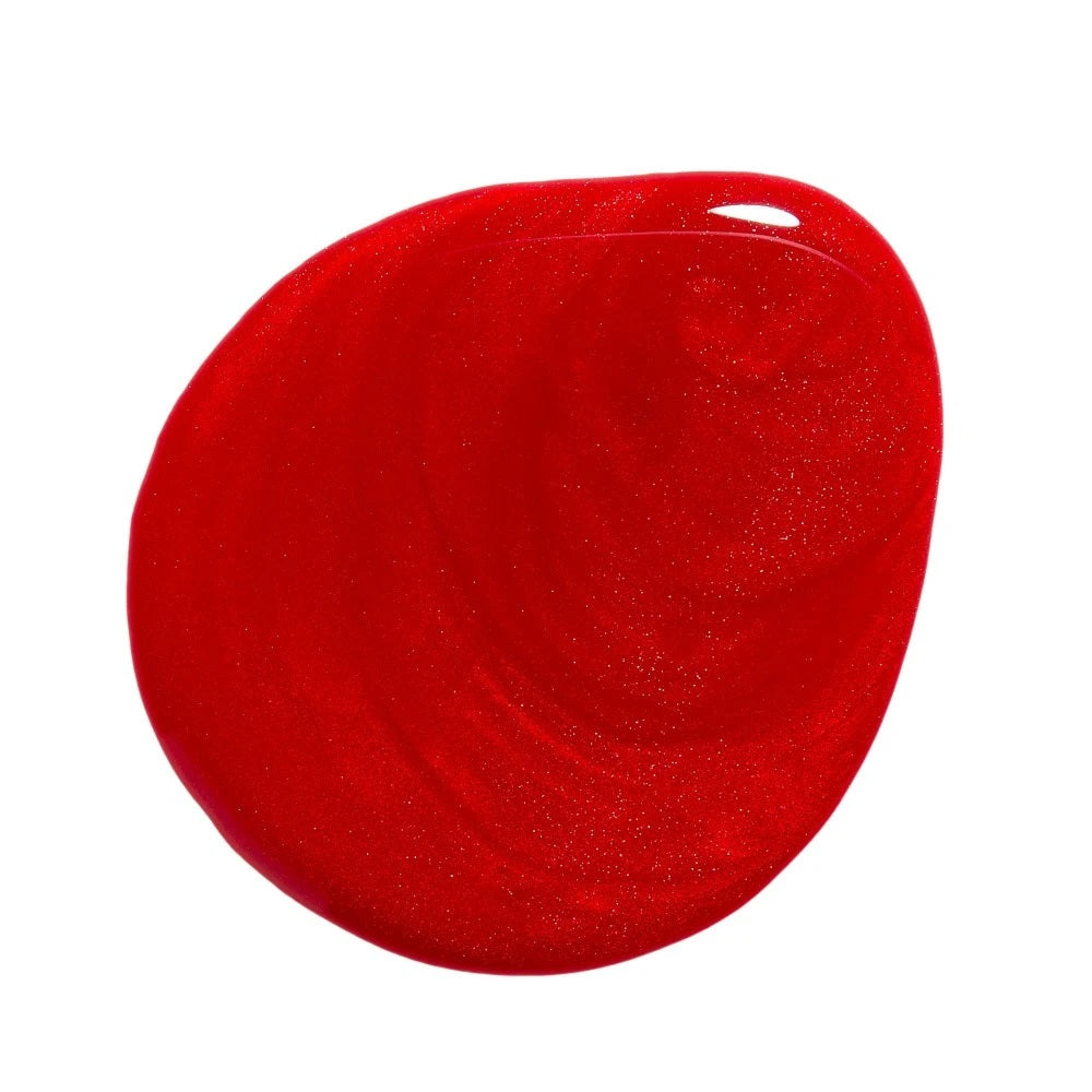 Huella Restore My Soul nail lacquer in a shimmery classic red, featuring a 15-free, vegan, and chip-resistant formula.