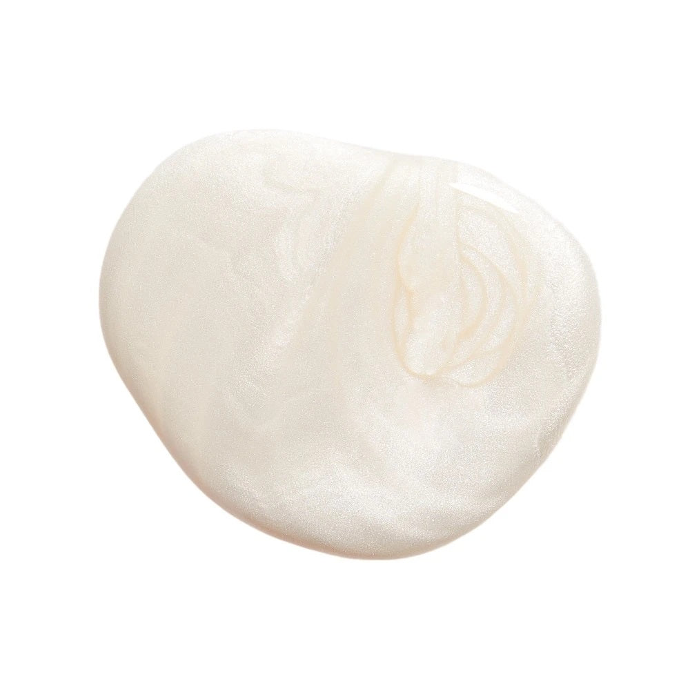 Huella World Is My Pearl nail lacquer in a semi-opaque pearly white, featuring a 15-free, vegan, and chip-resistant formula.