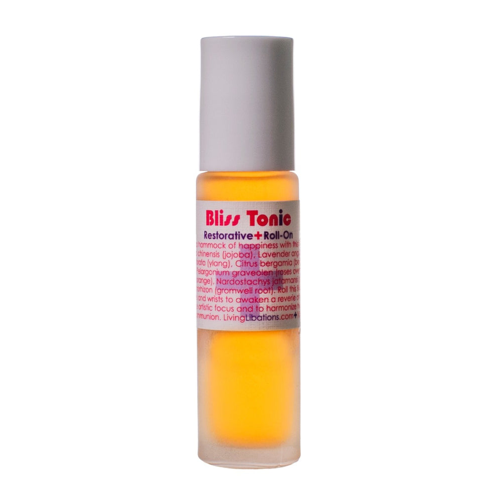 LIVING LIBATIONS Bliss Tonic - roll-on scent blend for body and soul. Combines euphoric essences in a portable tonic that inspires the senses and awakens the spirit. Now with a Rose Quartz rollerball, resonating with the heart chakra, for an added touch of bliss.